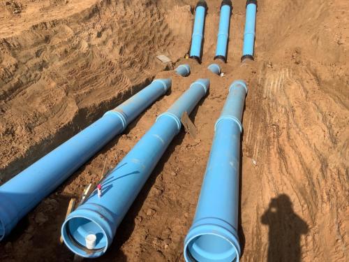 30" C-900 pipe being installed under the Fresno Canal